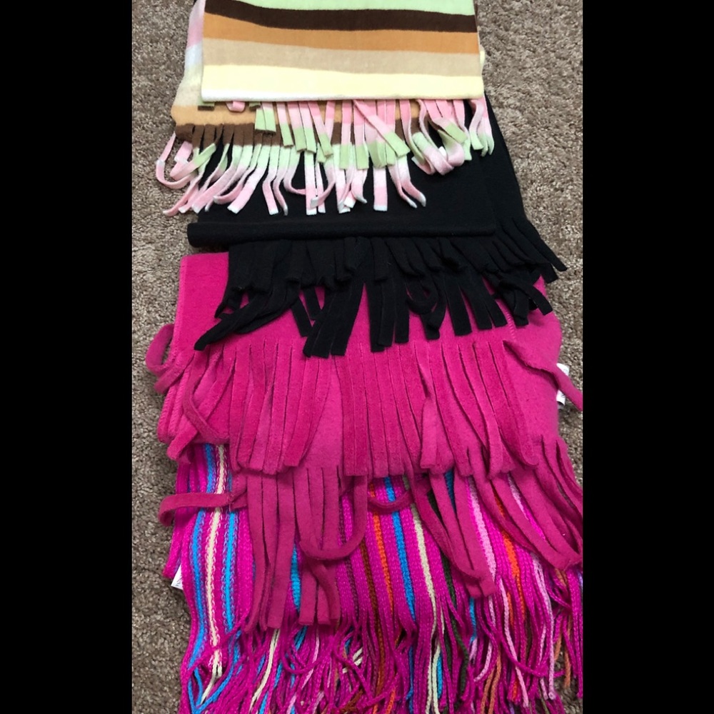 4 tassel ended scarves. All like new.